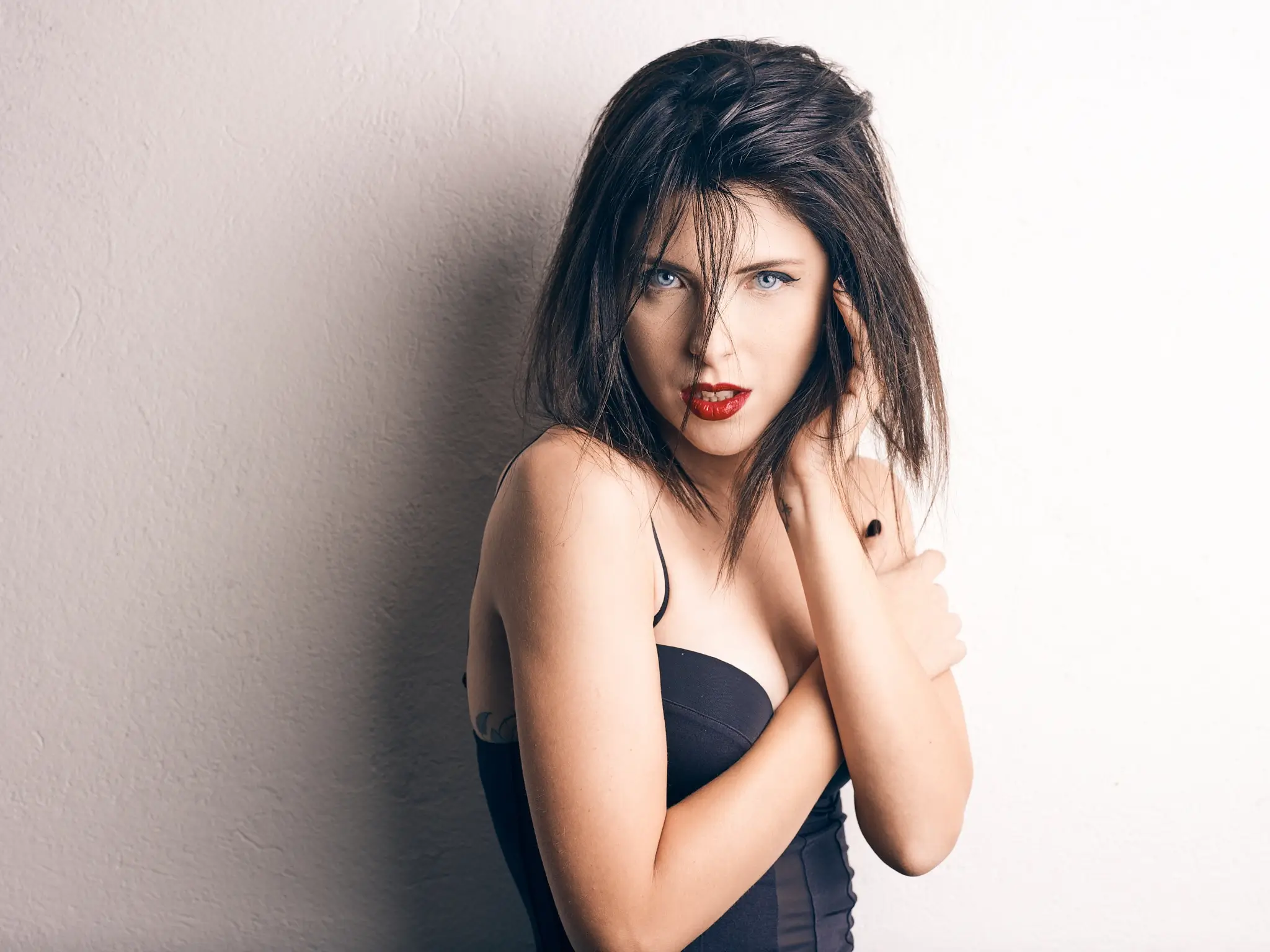 Studio portrait of brunette model on white background