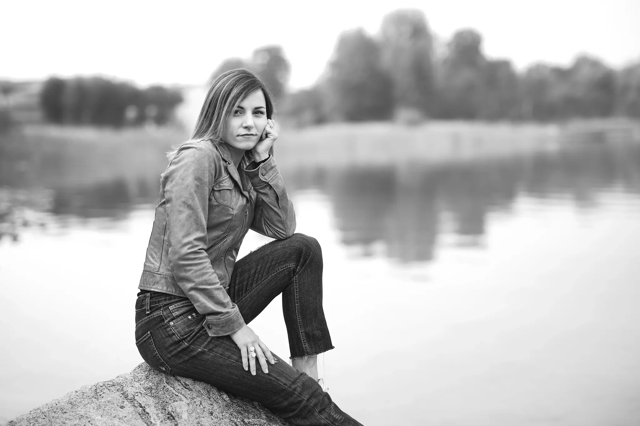 Black and white portrait of model on the lake