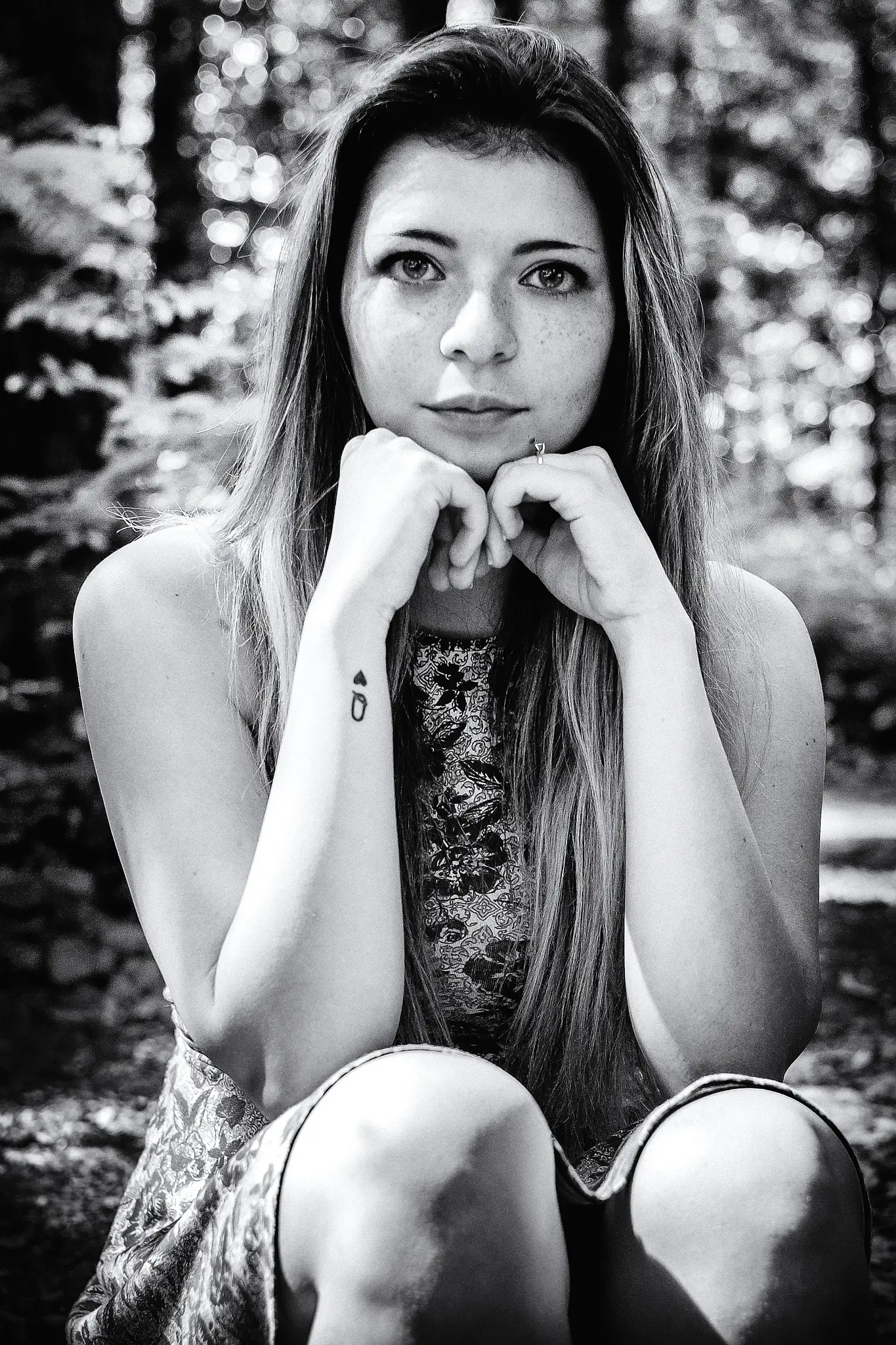Black and white outdoors portrait of brunette model