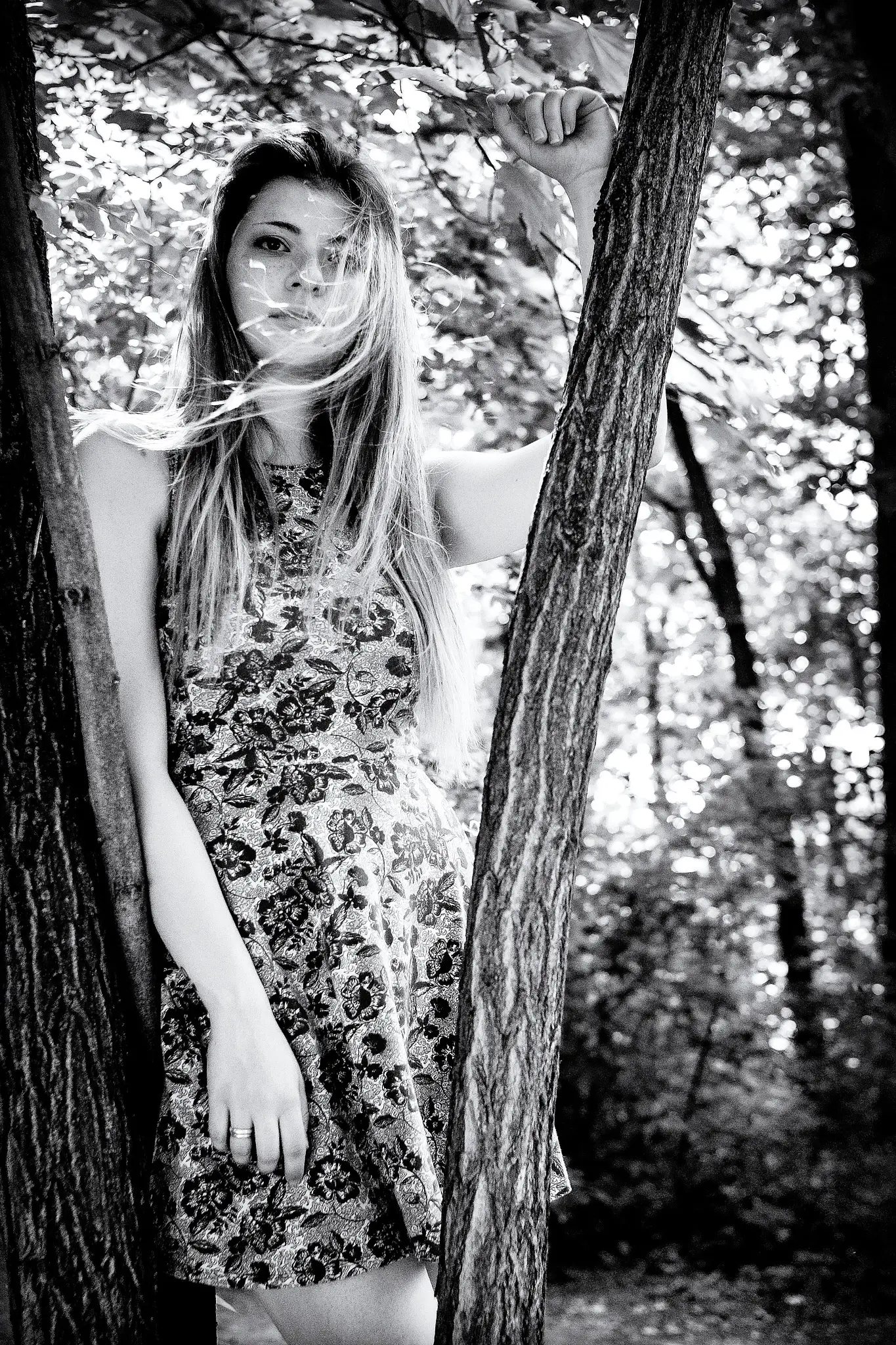 Black and white outdoors portrait of brunette model