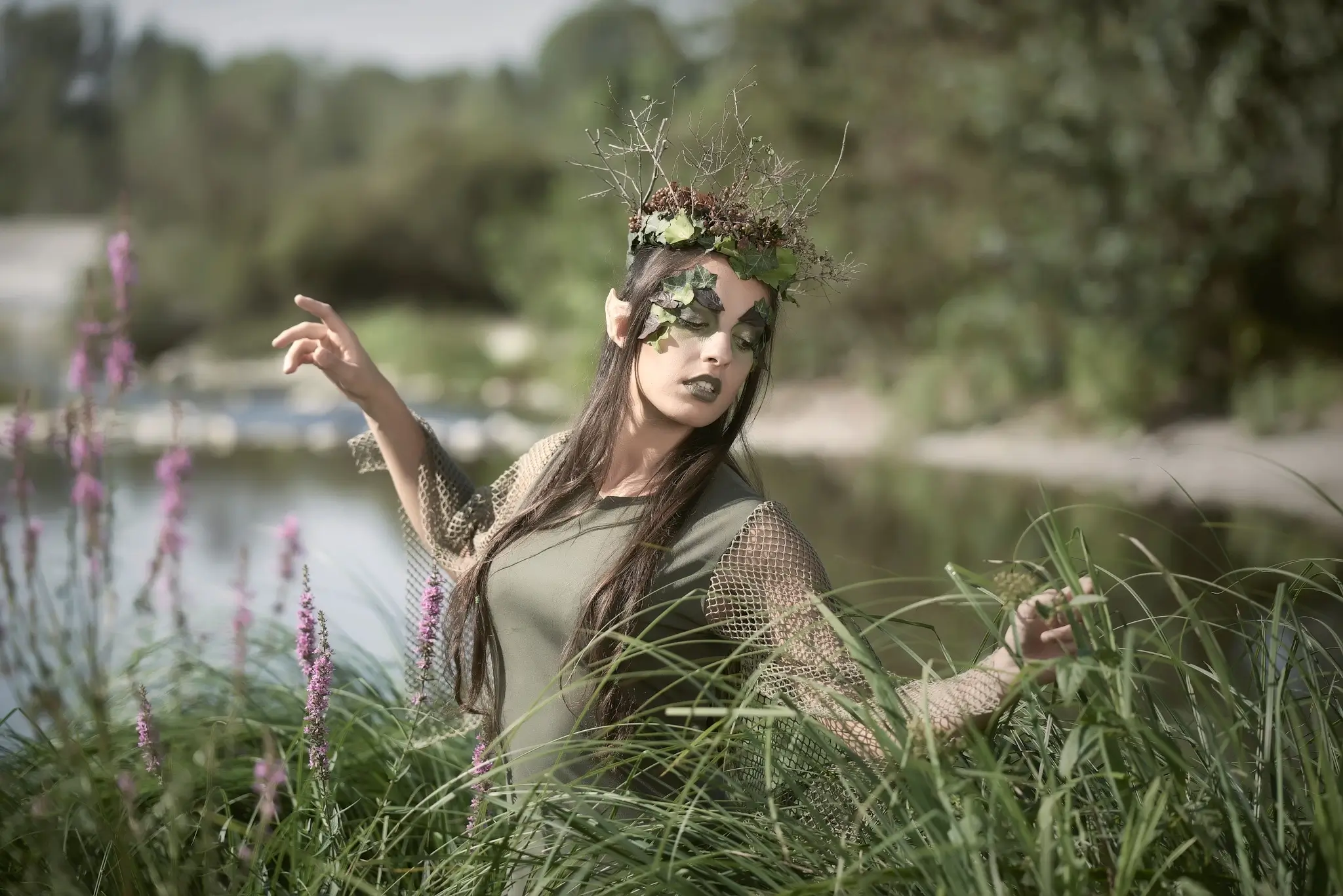 Outdoor portrait of a model with elvish dress and makeup