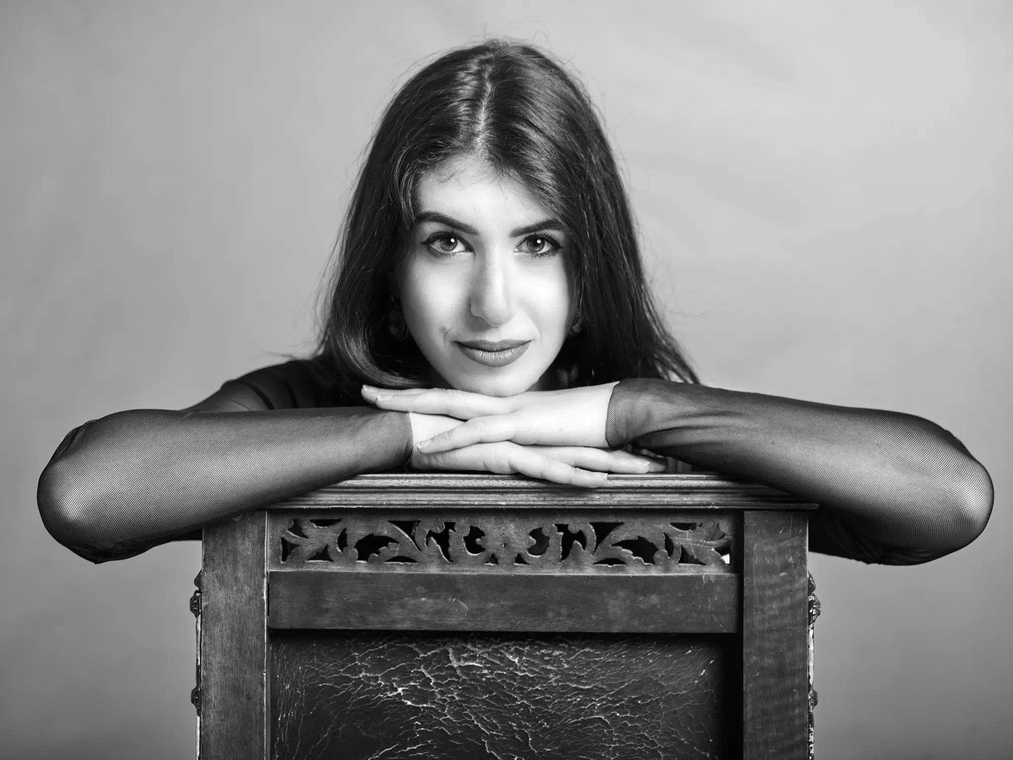 Unpublished - Black and white studio portrait of brunette model