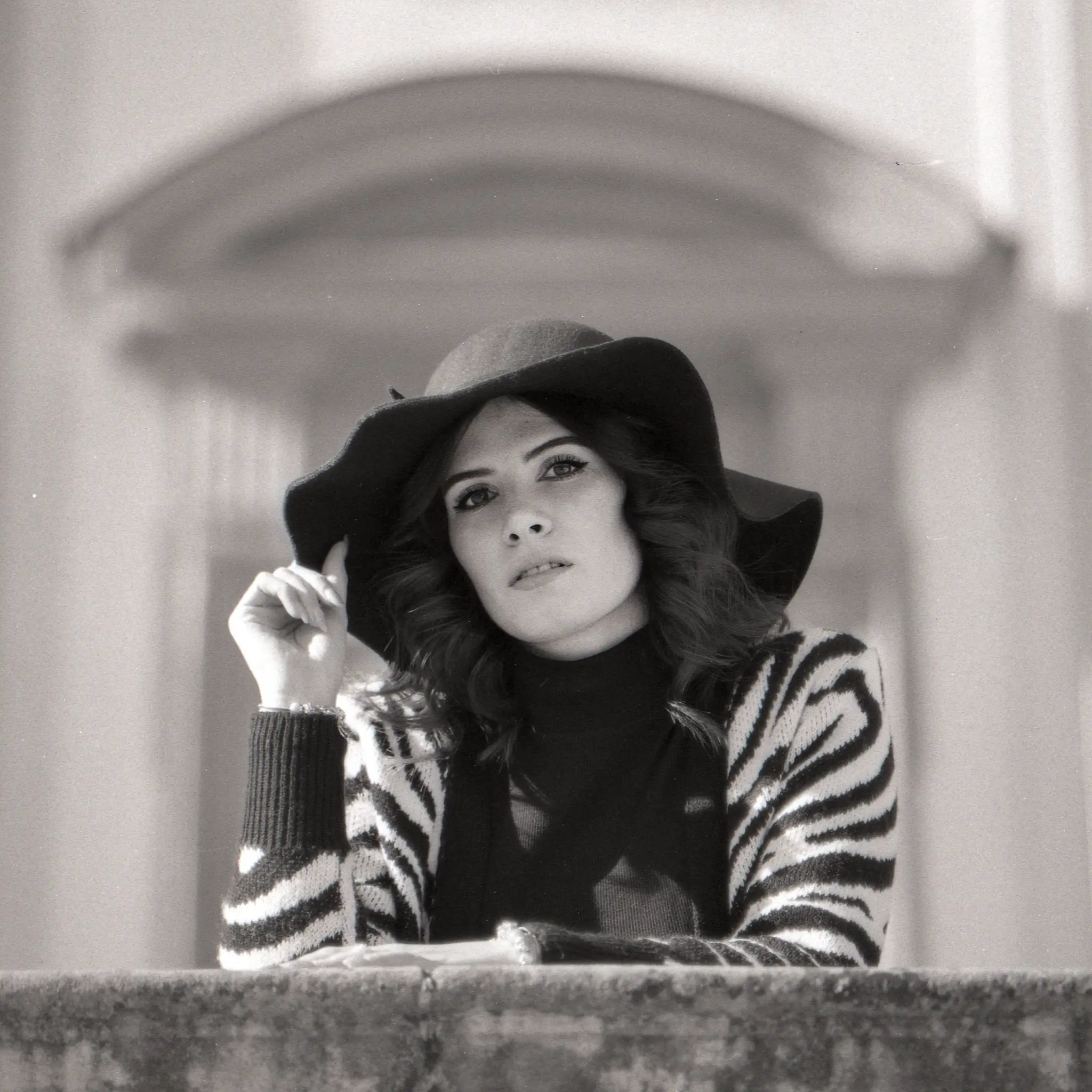 Black and white outdoors film portrait of brunette model
